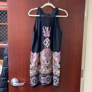 Sleeveless multi colored black dress… never worn